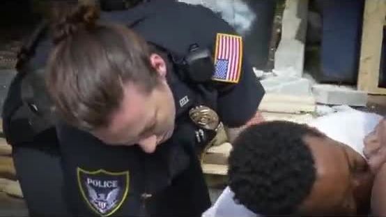 White cops make black suspect eat pussy against car outdoors